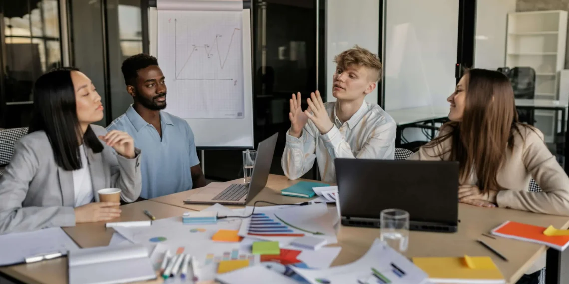 A group of executives inside a meeting room taking entrepreneurial decisions