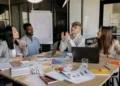 A group of executives inside a meeting room taking entrepreneurial decisions