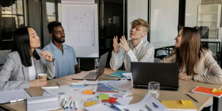 A group of executives inside a meeting room taking entrepreneurial decisions